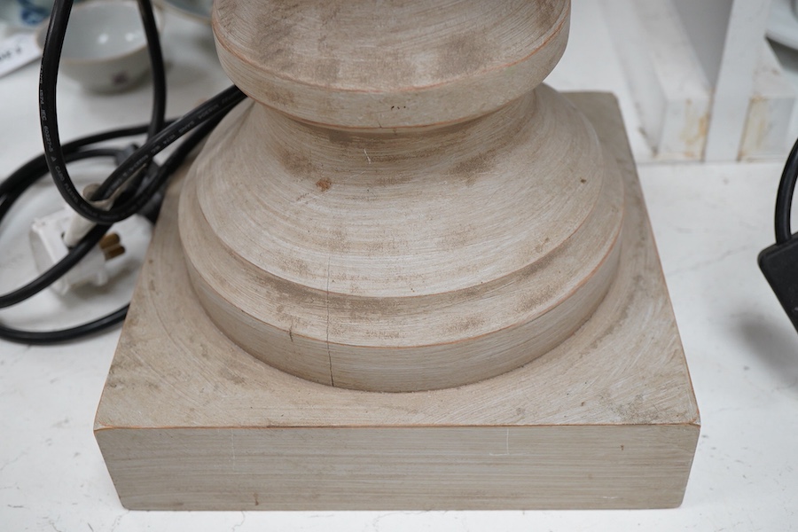 A pair of painted and carved wood lamps, 65cm to wood top